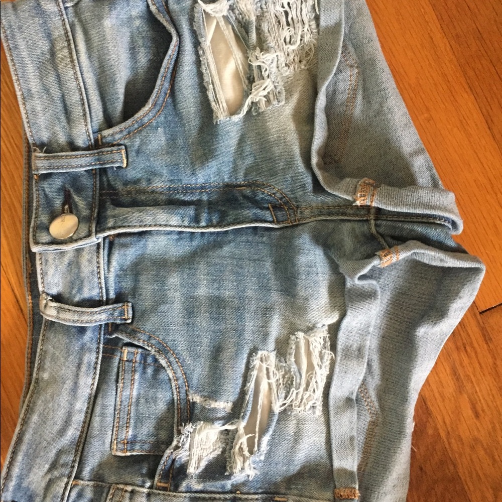 Light washed ripped jean shorts